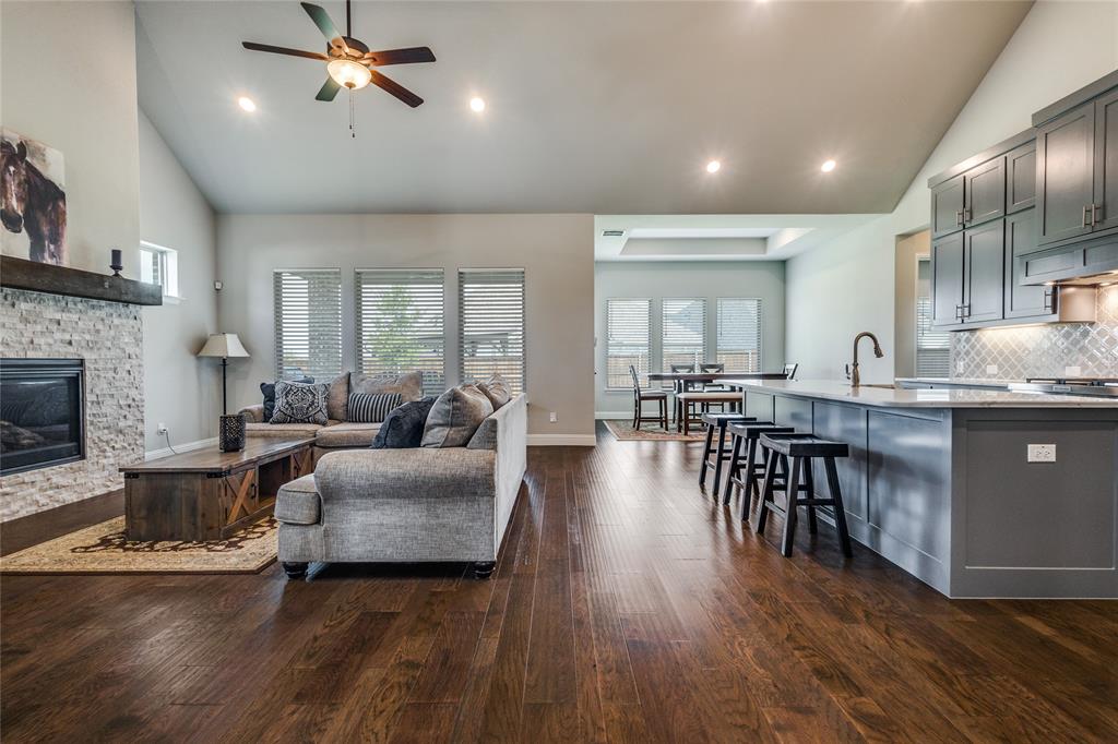 11112 Lacey Oak Ridge Flower Mound, TX 76226 - Photo 6 of 40 a living room with furniture and a wooden floor