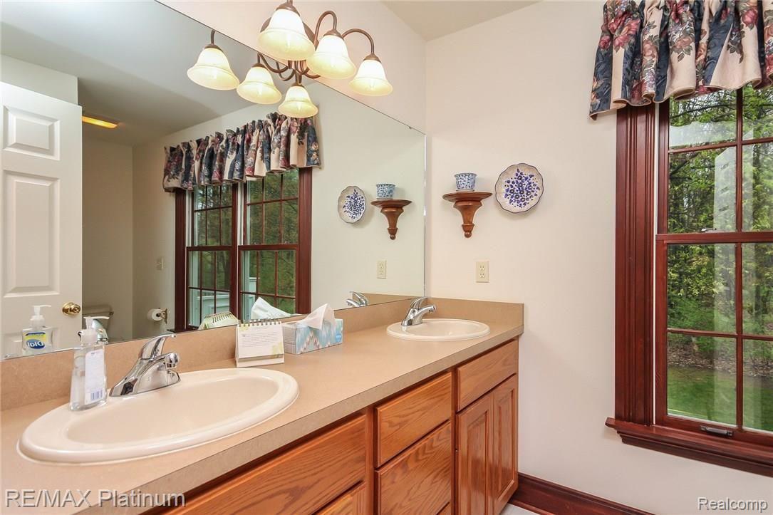 6945 Gawley Road Pinckney, MI 48169 - Photo 41 of 76 Master Bath with his and her sinks.