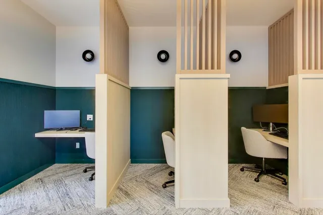 a view of kitchen with furniture and wooden floor