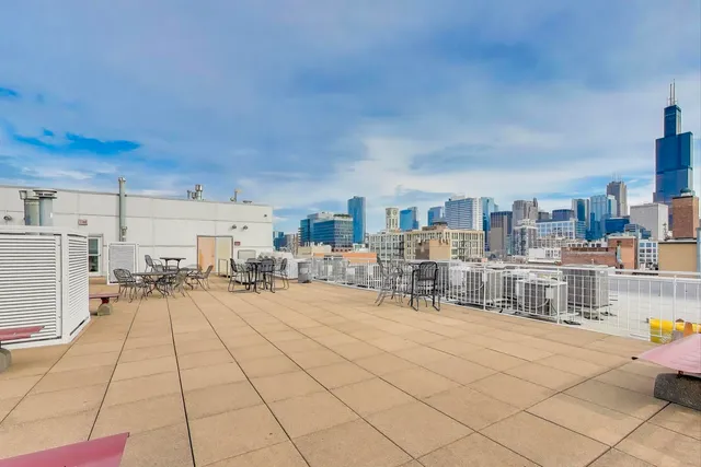 a room with lots of table and chairs