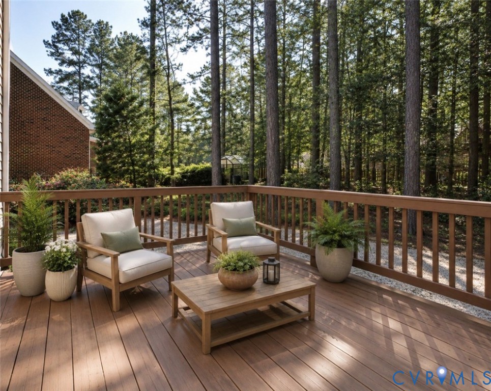 11385 Winding River Road Providence Forge, VA 23140 - Photo 39 of 43 a view of a patio with couches chairs and wooden floor
