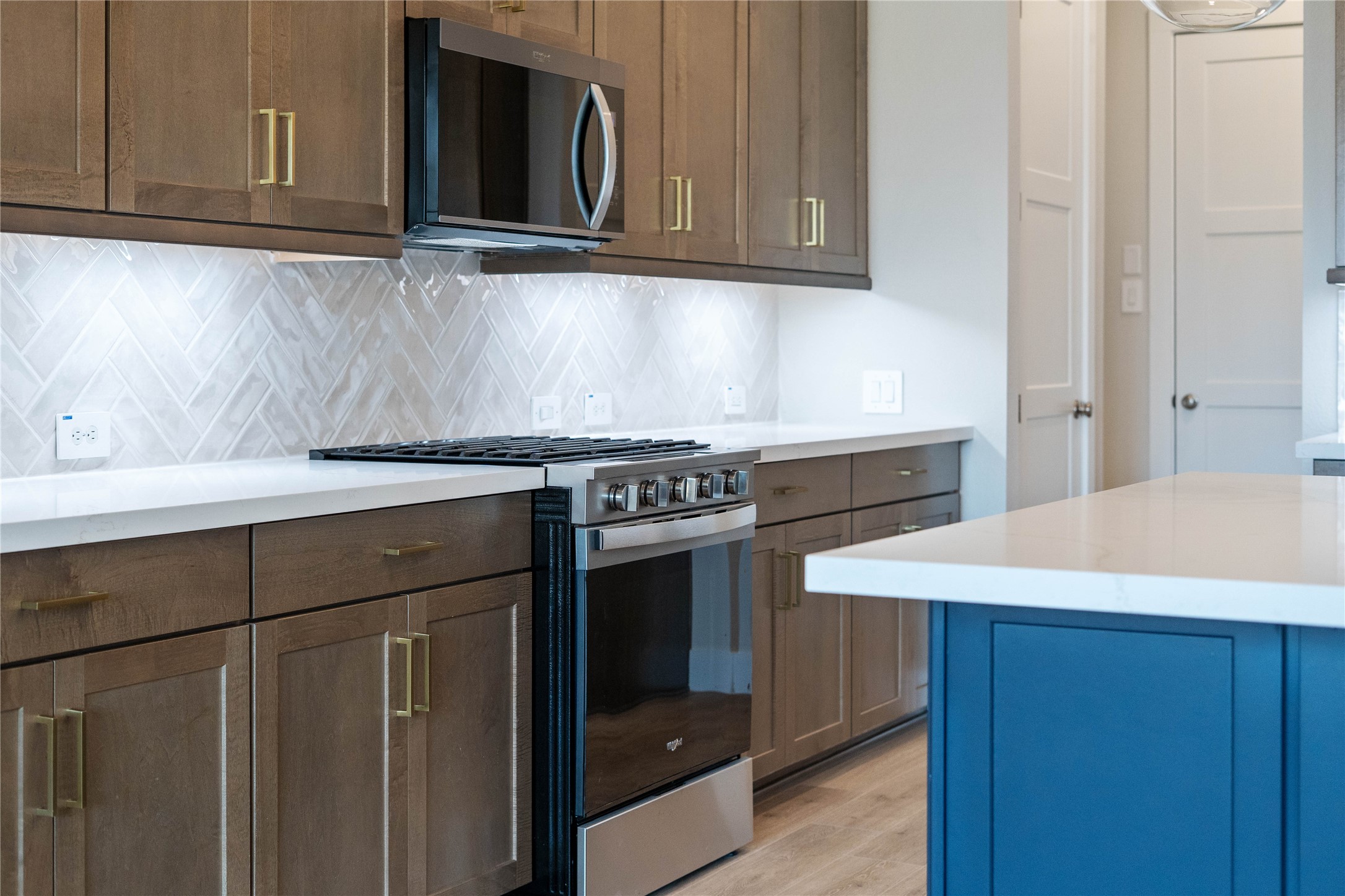 9123 Petroglyph Pt Court Porter, TX 77365 - Photo 23 of 43 Whirlpool Stainless Steel appliances. Featured here are the gas range and microwave set.