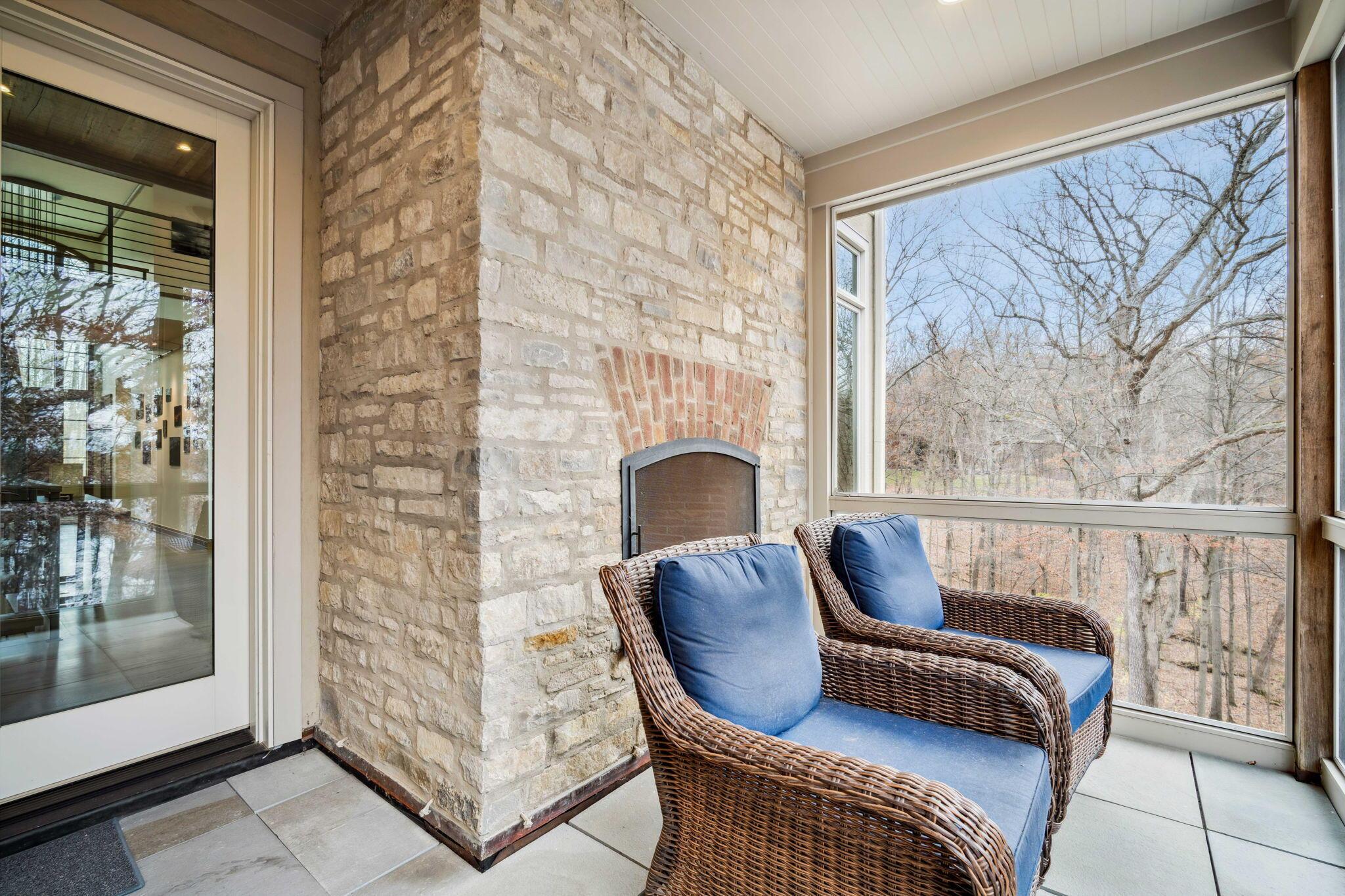 7805 Cubbage Road Westerville, OH 43081 - Photo 28 of 143 Great room screened in porch with fireplace, high above Hoover.