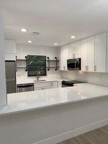 Undisclosed Address Jupiter, FL 33458 - Photo 2 of 17 kitchen I