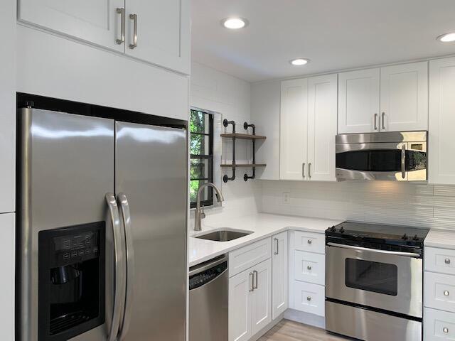 Undisclosed Address Jupiter, FL 33458 - Photo 4 of 17 kitchen