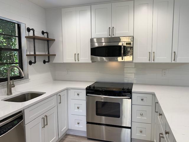 Undisclosed Address Jupiter, FL 33458 - Photo 5 of 17 kitchen iii