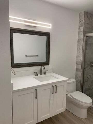 Undisclosed Address Jupiter, FL 33458 - Photo 9 of 17 Guest bath