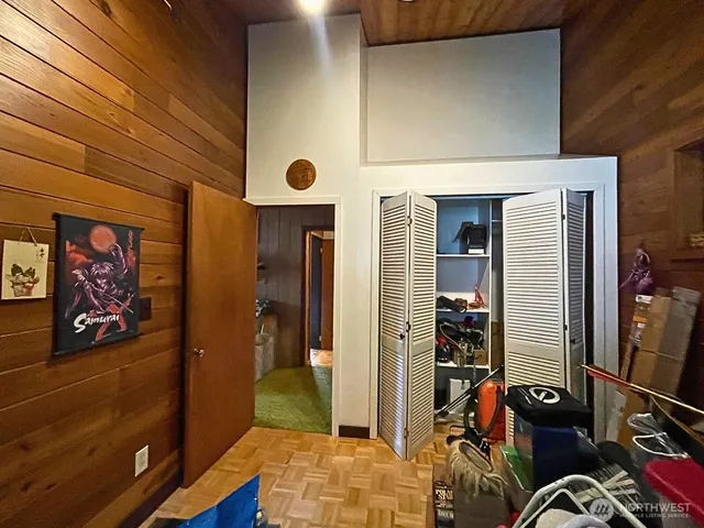 a bathroom with a granite countertop bathtub shower sink and toilet