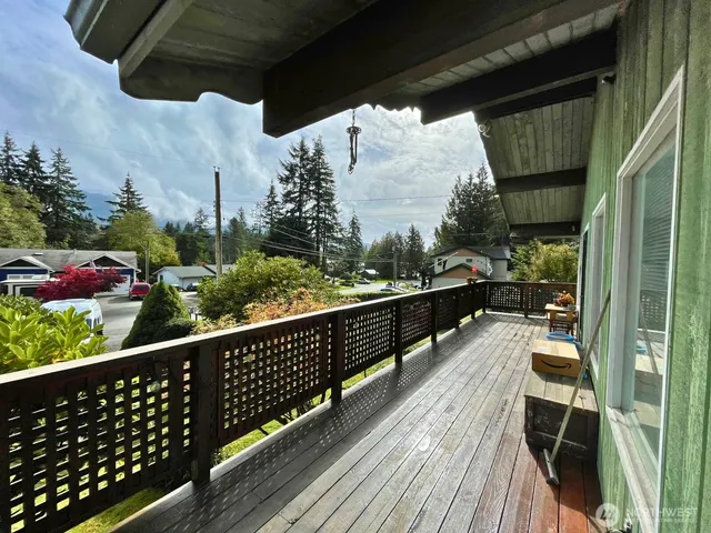 a view of balcony with furniture