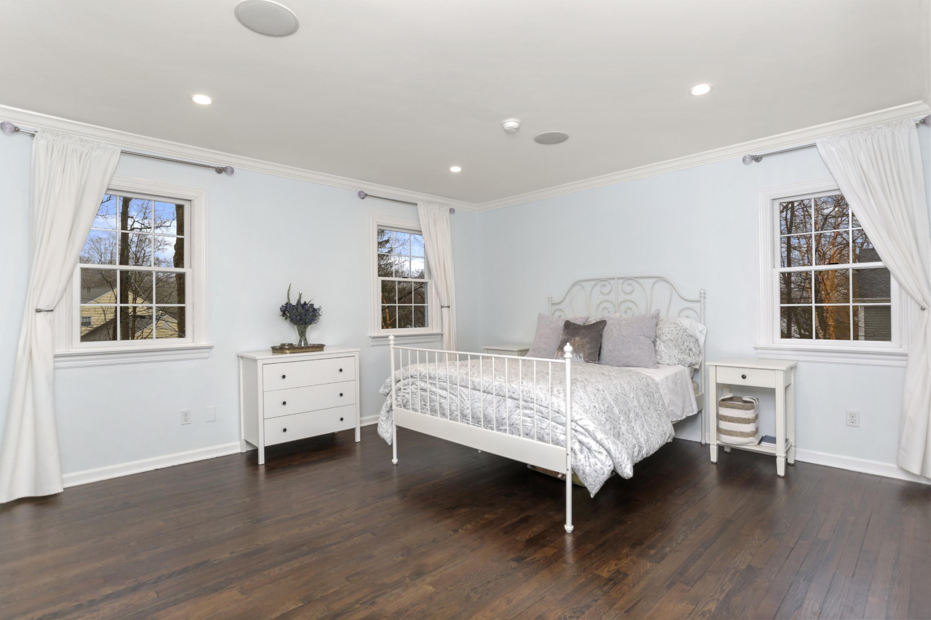54 Country Club Road Darien, CT 06820 - Photo 25 of 40 a bed room with a bed and a window