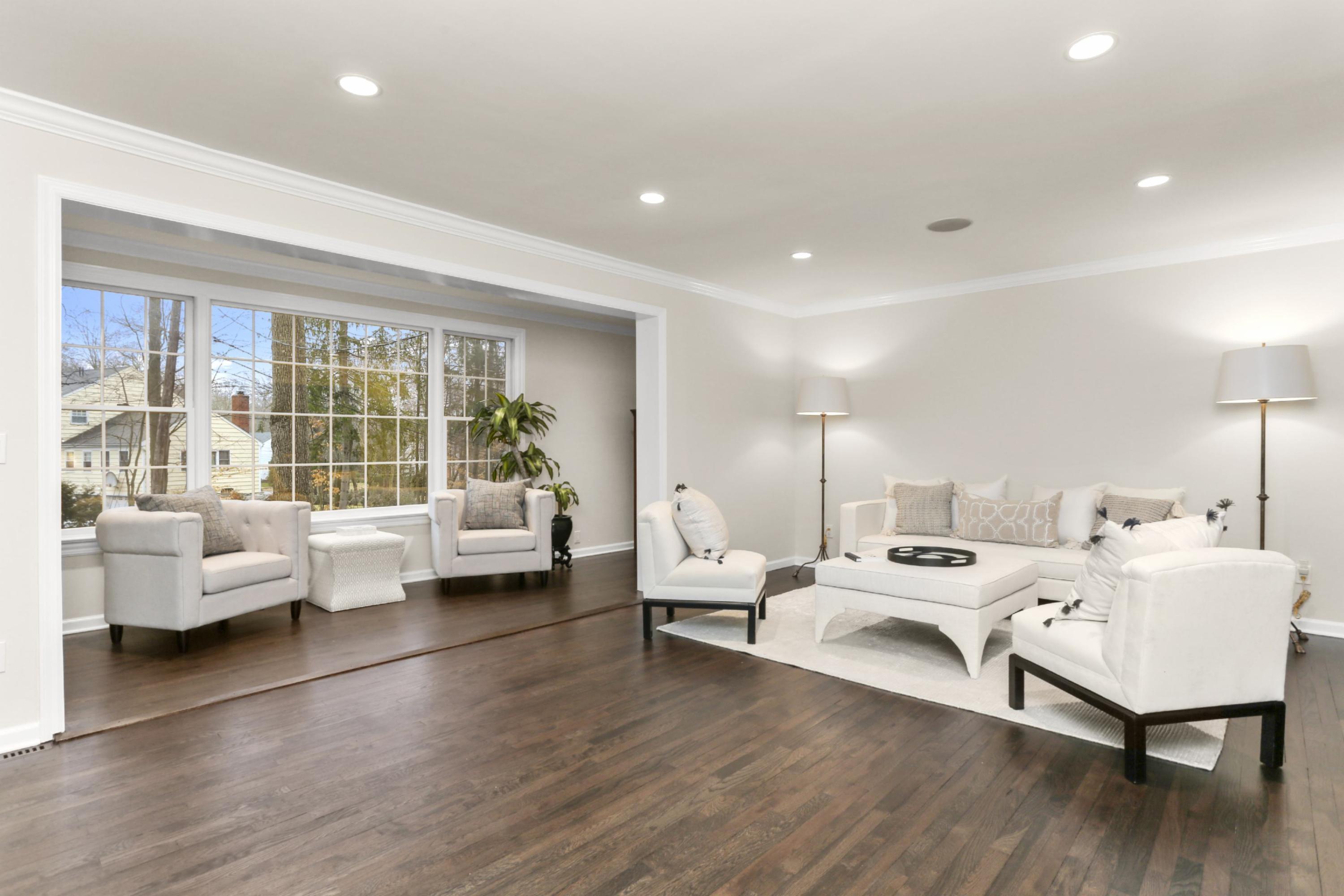 54 Country Club Road Darien, CT 06820 - Photo 6 of 40 a living room with furniture and a large window