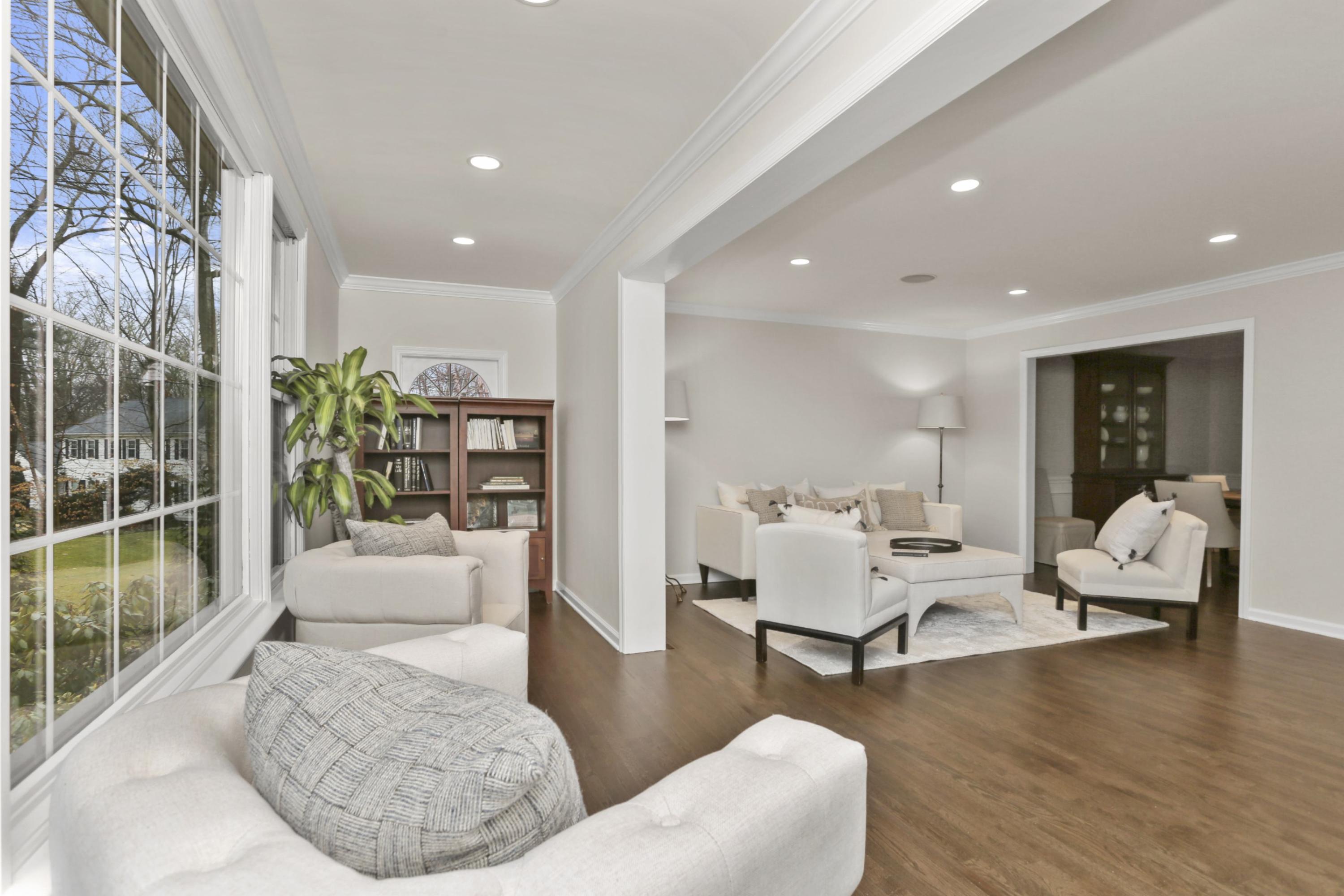 54 Country Club Road Darien, CT 06820 - Photo 7 of 40 a living room with furniture and wooden floor