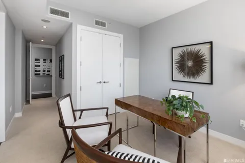 a bedroom with bed and window