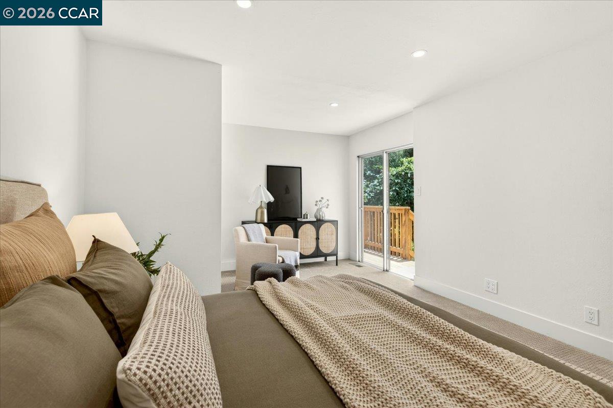 24 Las Vegas Road Orinda, CA 94563 - Photo 28 of 47 a bedroom with a bed and wooden floor