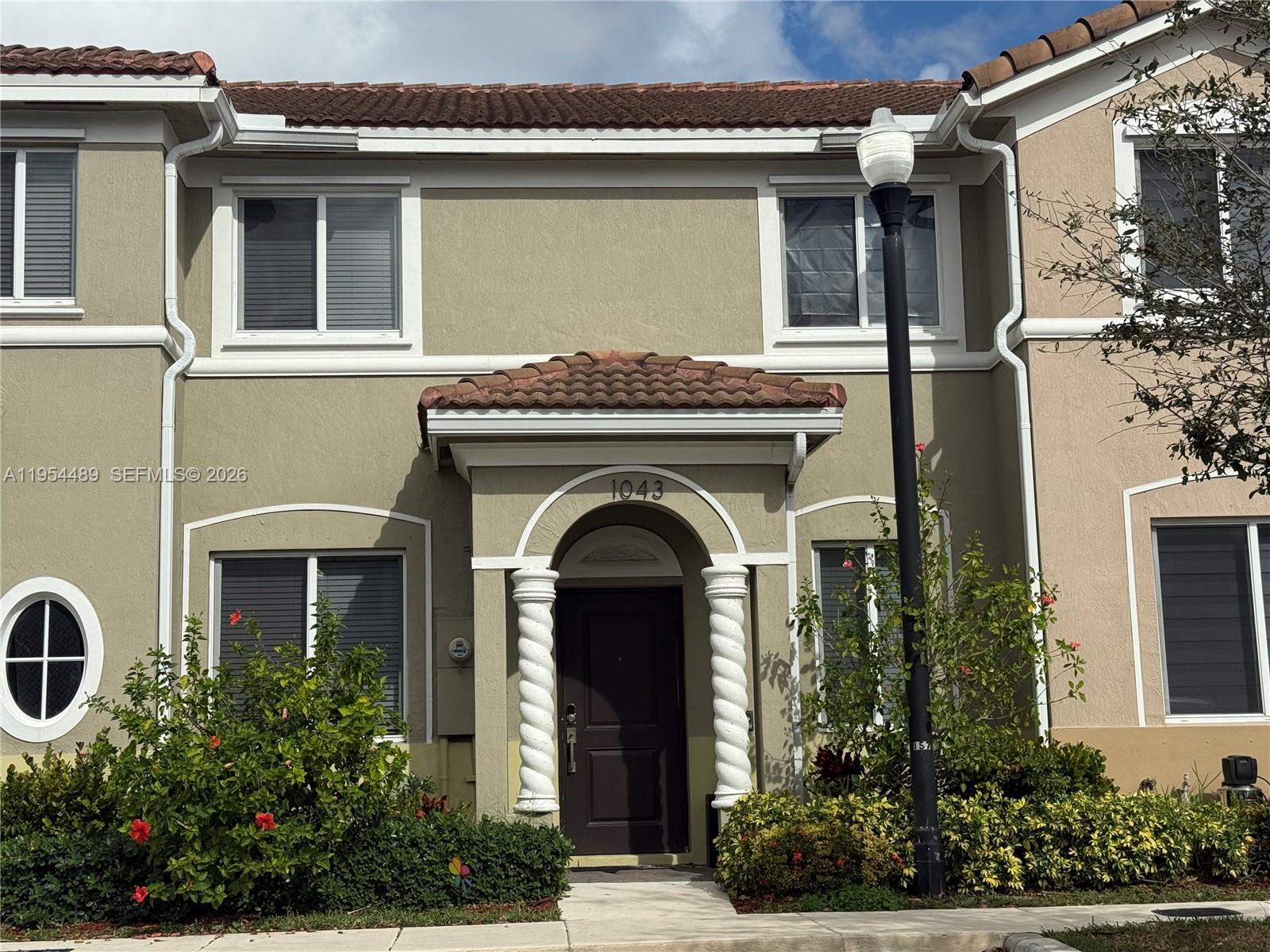 1043 Southeast 24th Avenue Homestead, FL 33035 - Photo 1 of 25 front view of a house