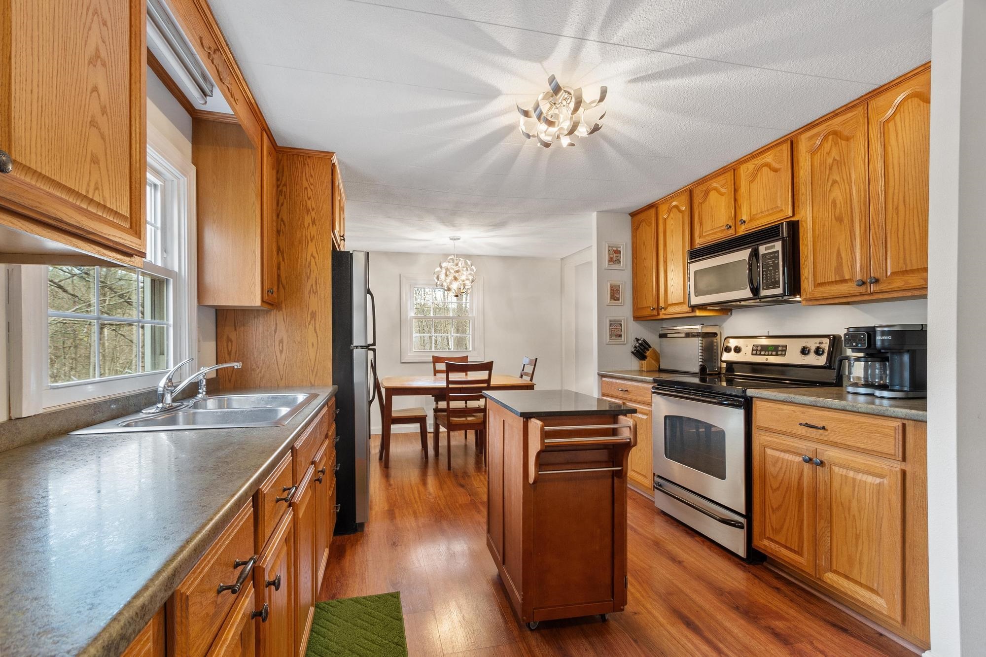 1256 Mammoth Road Pelham, NH 03076 - Photo 19 of 51