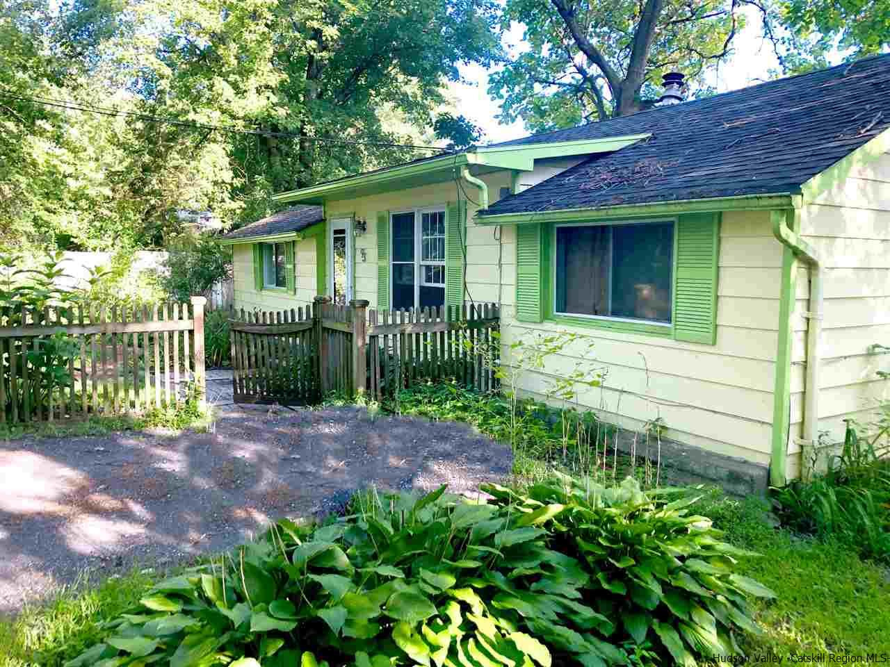 93 River Road New Paltz, NY 12561 - Photo 14 of 15 a front view of a house with a garden