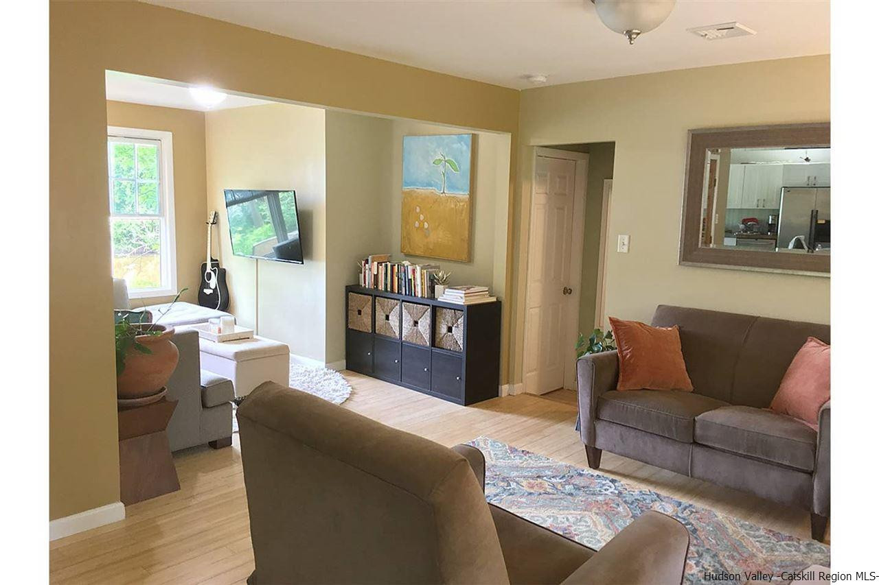 93 River Road New Paltz, NY 12561 - Photo 7 of 15 a living room with furniture and a window