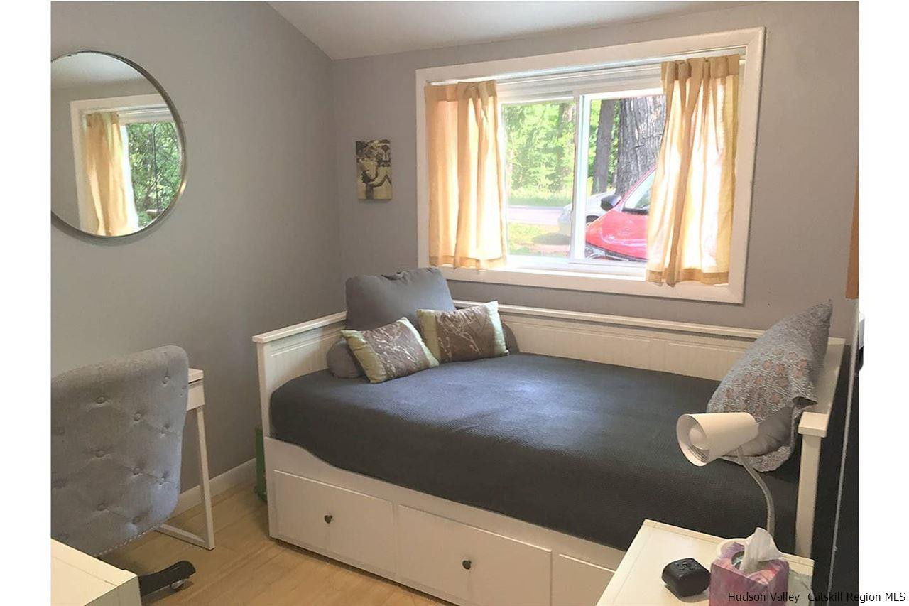 93 River Road New Paltz, NY 12561 - Photo 10 of 15 a bathroom with a bathtub and a window