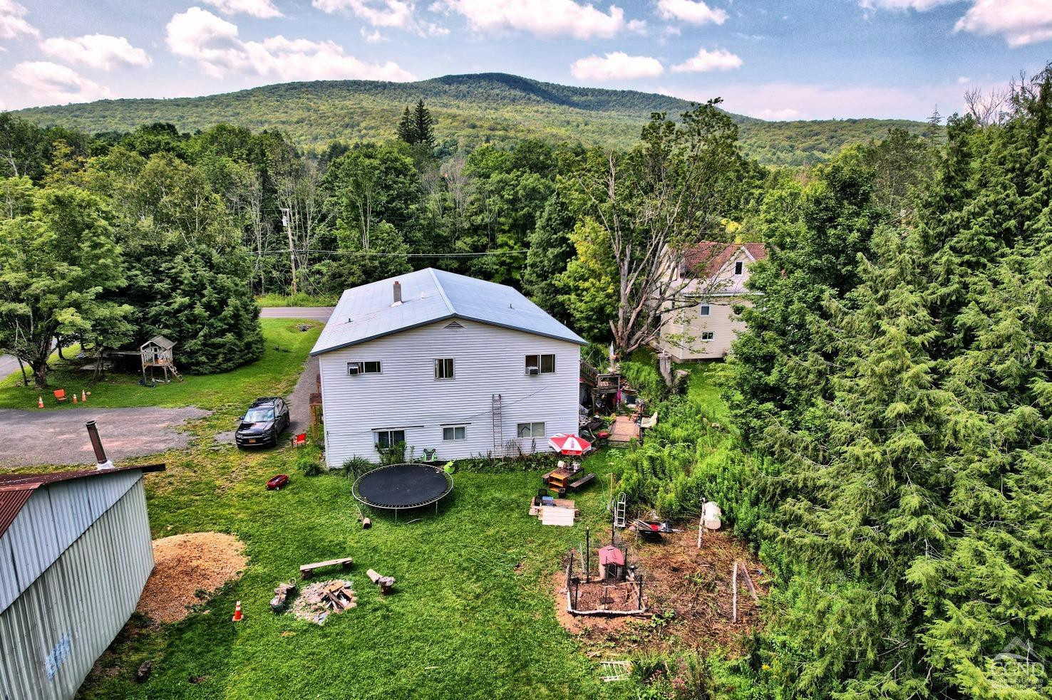 41 County Road 40 Windham, NY 12439 - Photo 11 of 36 an aerial view of a house with a yard