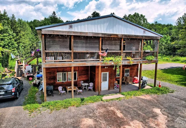a view of a car park in front of house