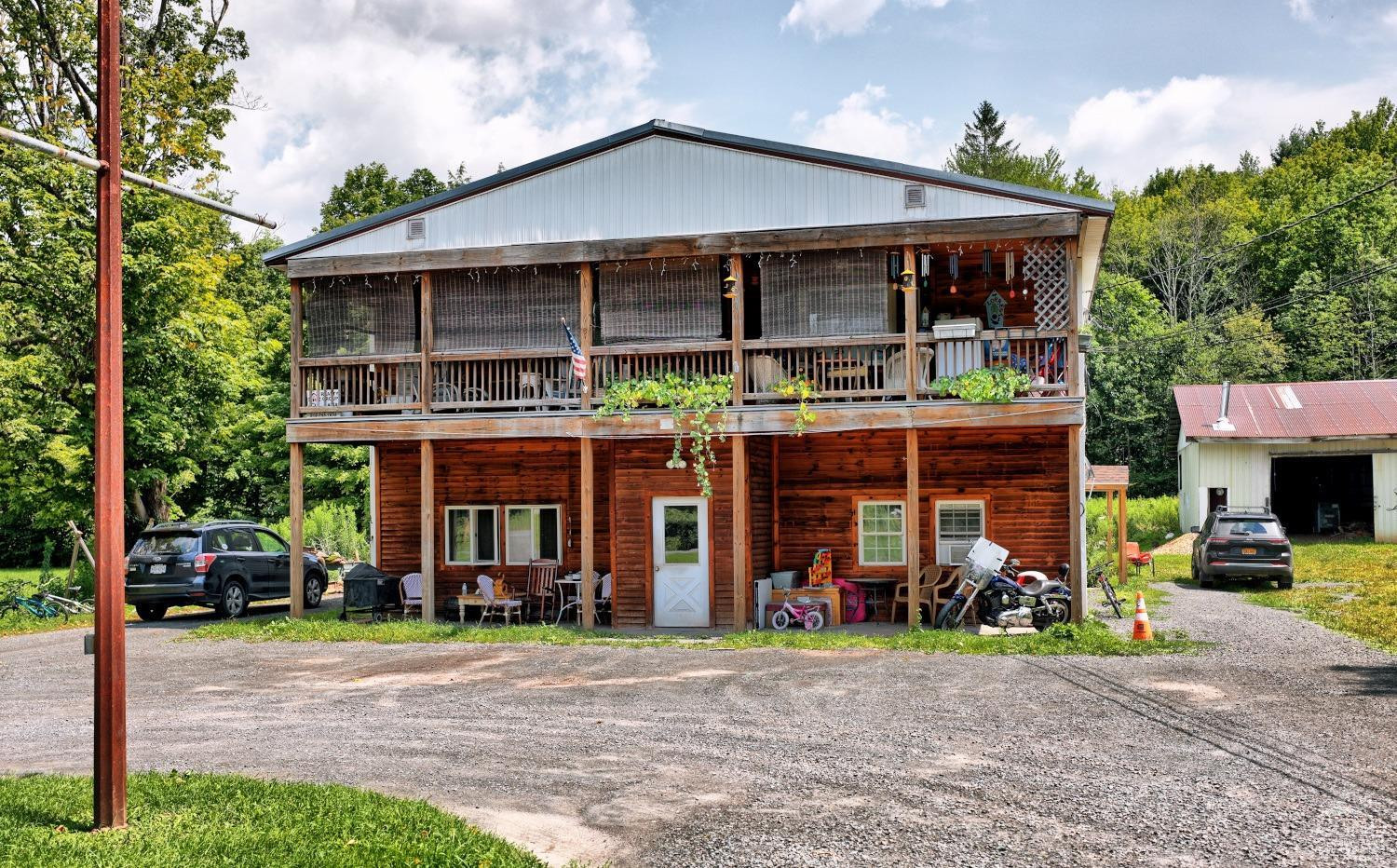 41 County Road 40 Windham, NY 12439 - Photo 25 of 36 a front view of a house with porch