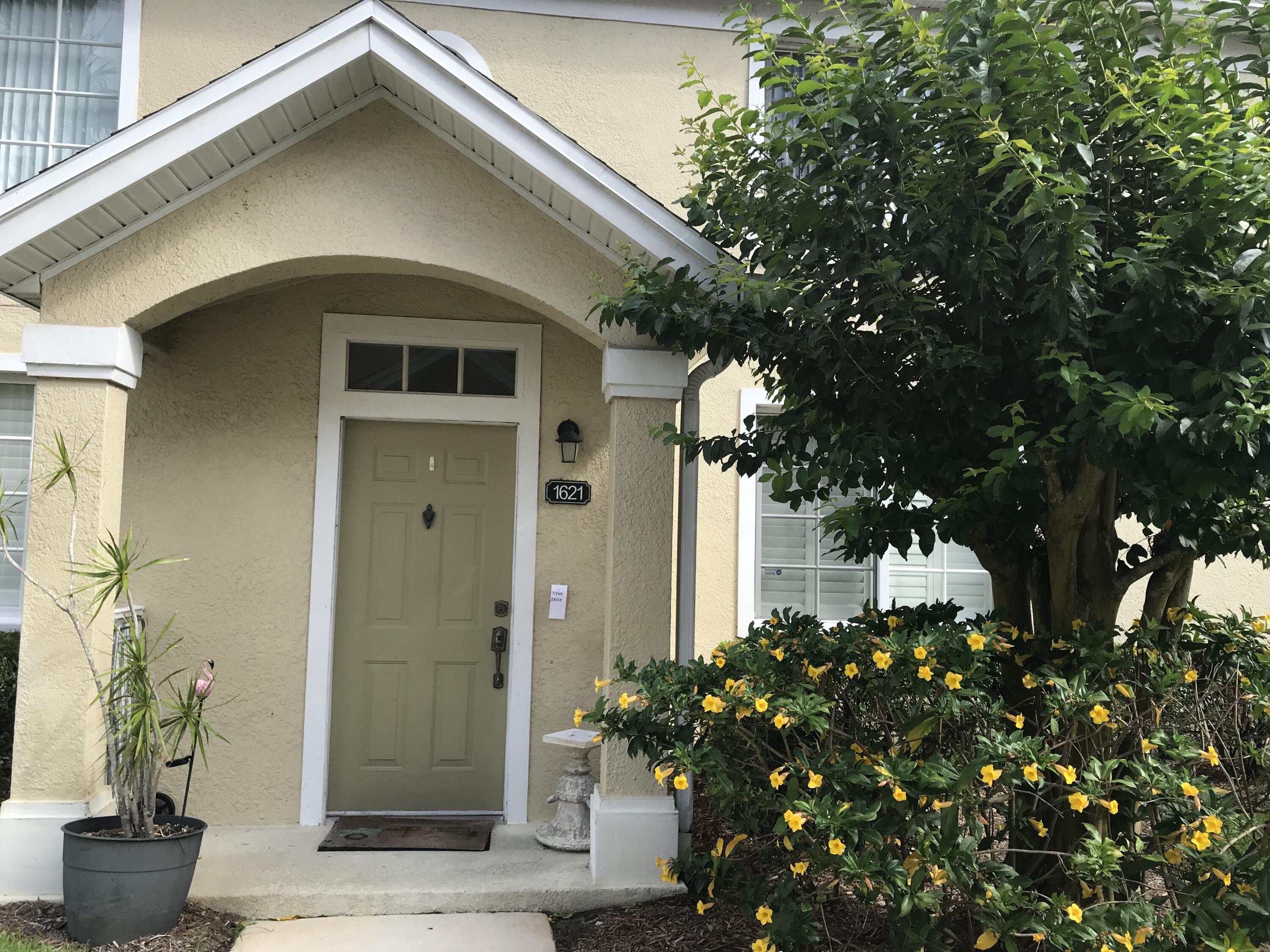 1621 Southeast Pomeroy Street, Unit 56 Stuart, FL 34997 - Photo 1 of 8 Entrance