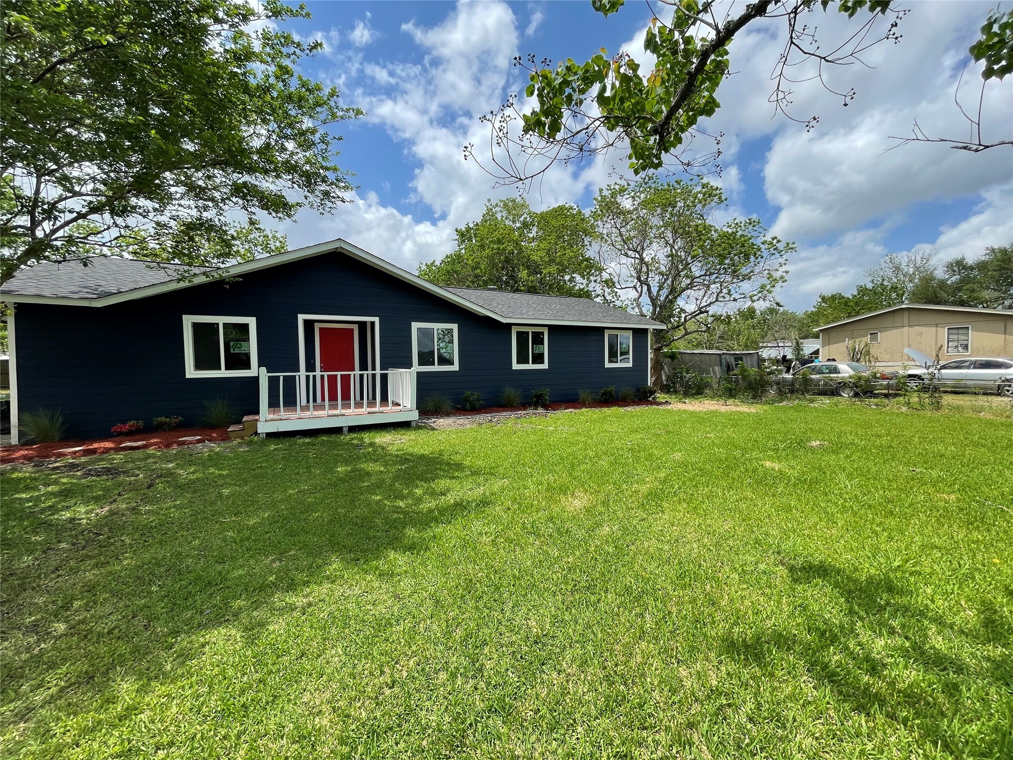 2734 Ash Road Pearland, TX 77584 - Photo 6 of 15 a view of a house with a yard