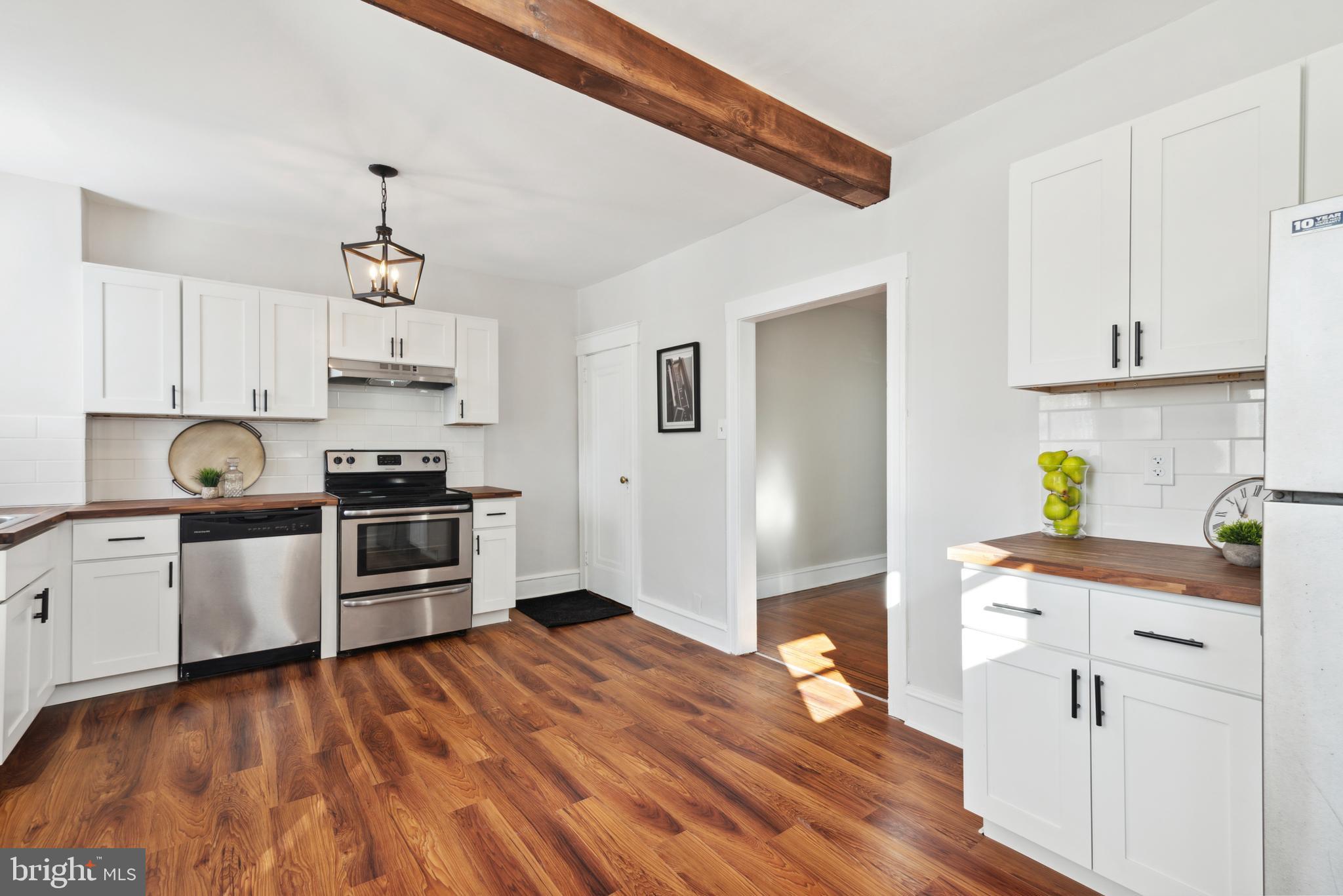 608 Arbor Road Cheltenham, PA 19012 - Photo 13 of 26 Wood beams & butcher block countertops