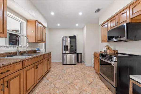 $565,000 | 16110 Northwest 28th Place, Miami Gardens, FL 33054