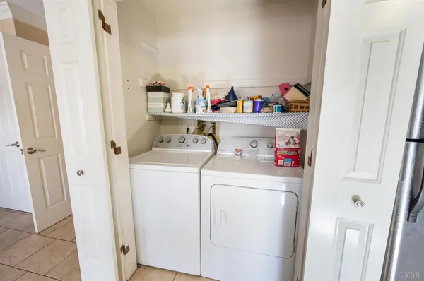 a bedroom with two beds and painted walls