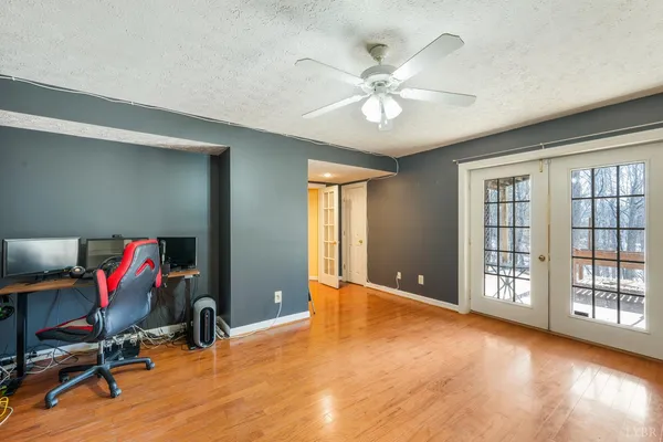 a view of mountain with sunset in background