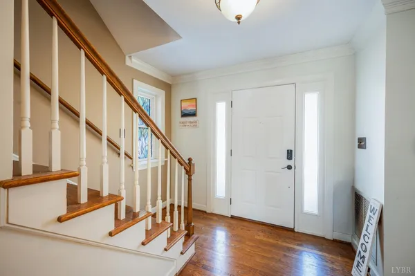 a spacious bathroom with a double vanity sink and mirror