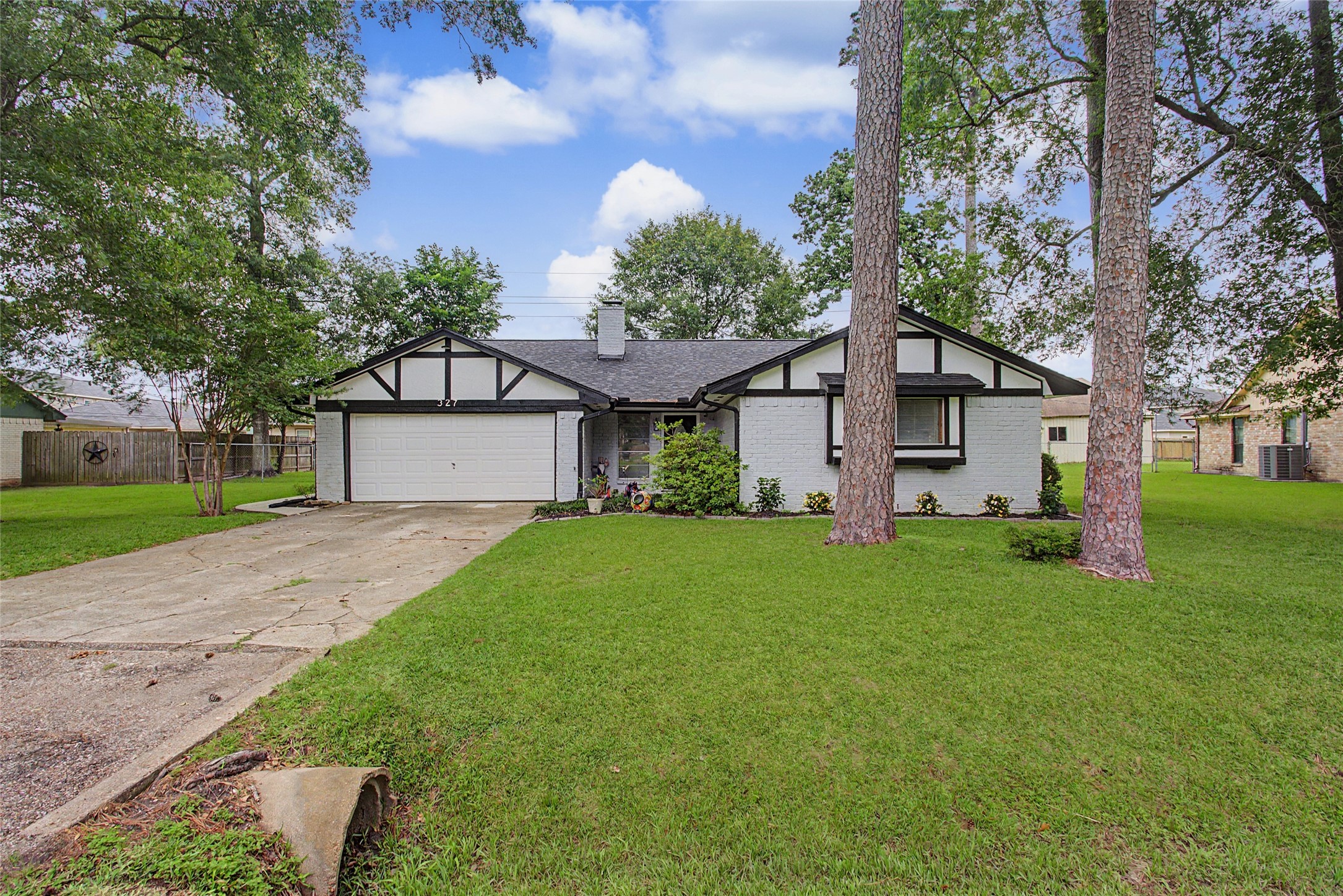 327 Fir Ridge Drive Huffman, TX 77336 - Photo 3 of 25 Exterior paint updated in 2023