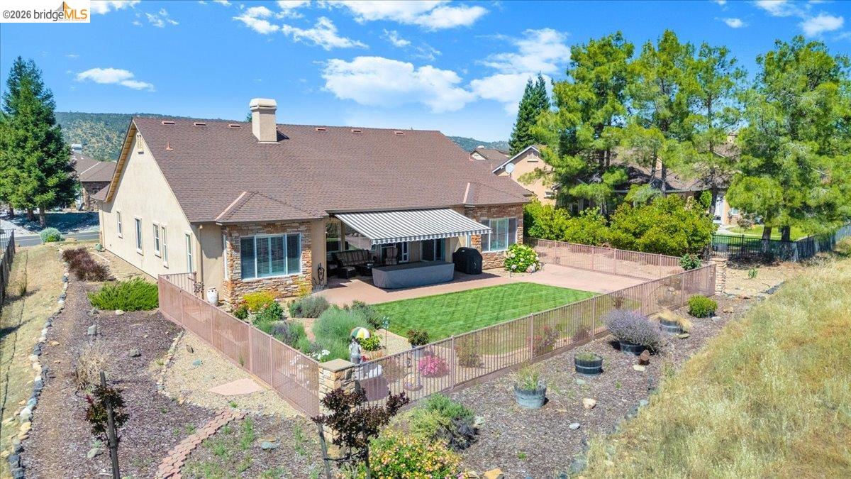158 Rock Ridge Lane Copperopolis, CA 95228 - Photo 48 of 72 Stucco exterior with stone veneer accents and a contrasting roof