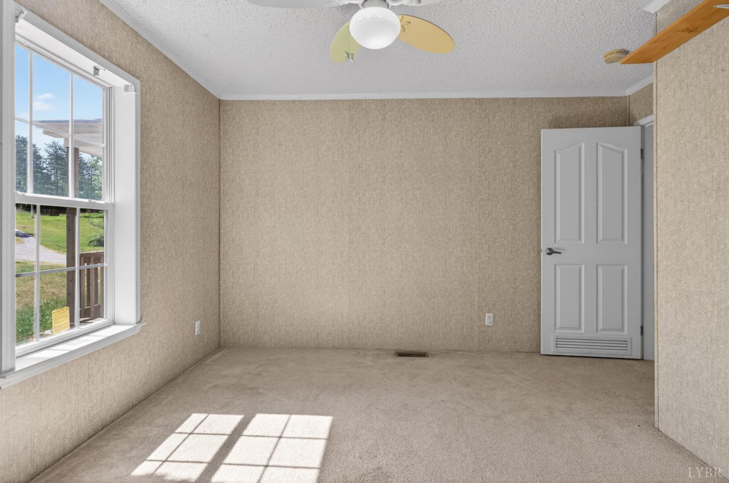 1811 Mohawk Road Gladys, VA 24554 - Photo 23 of 51 a view of an empty room with a window