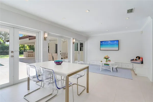 a bathroom with a granite countertop sink a toilet a shower and a mirror