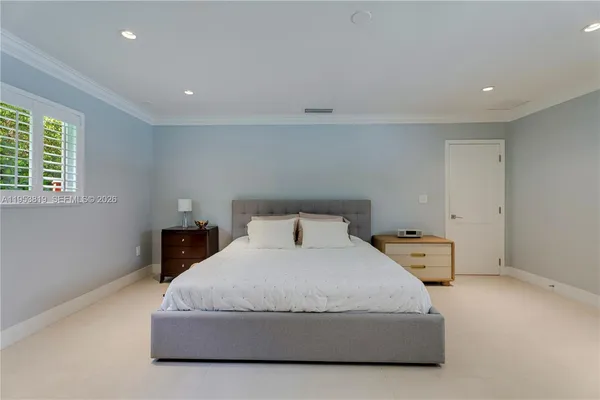 a utility room with sink dryer and washer