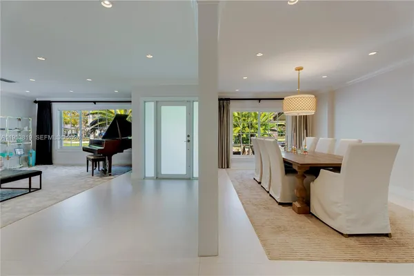 a view of a living room and dining room