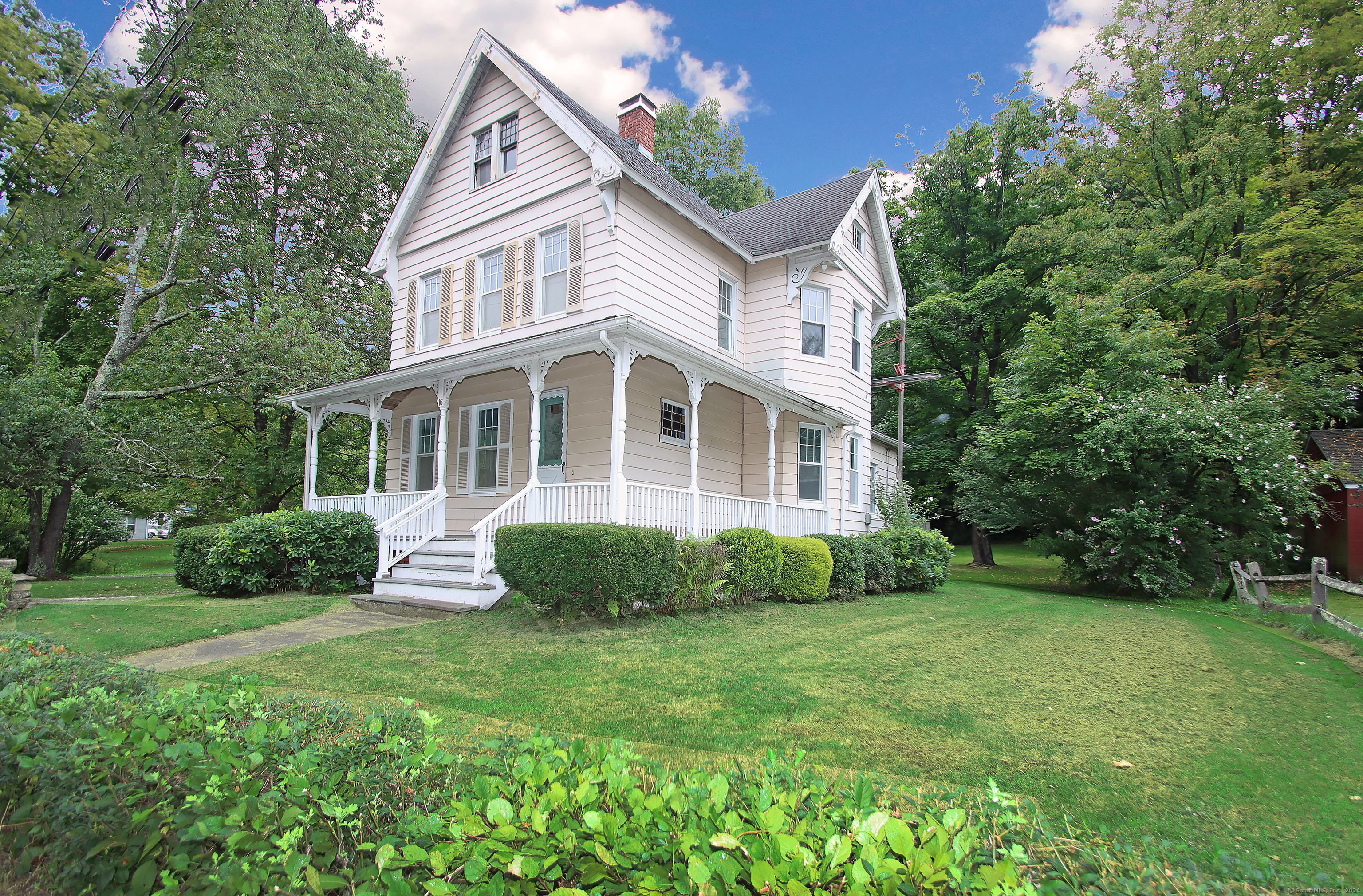 16 Glen Road Newtown, CT 06482 - Photo 1 of 1 a front view of a house with a yard