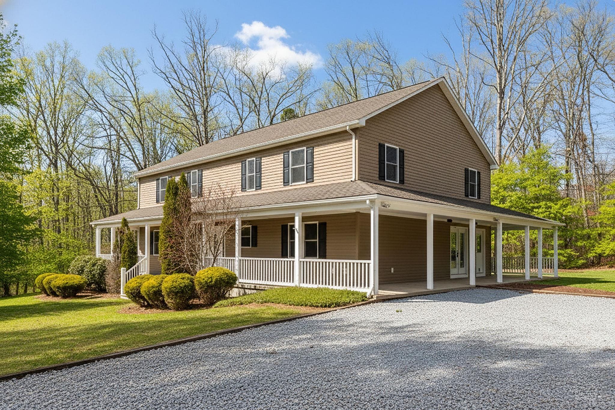 198 Turk Mountain Lane Waynesboro, VA 22980 - Photo 2 of 58 a front view of a house with a yard and potted plants