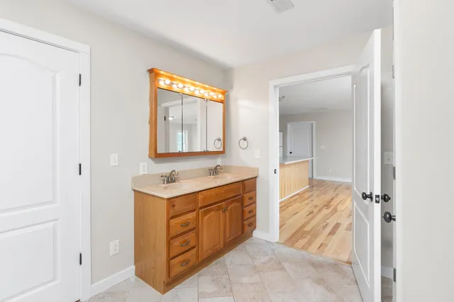 a view of a bathroom with shower