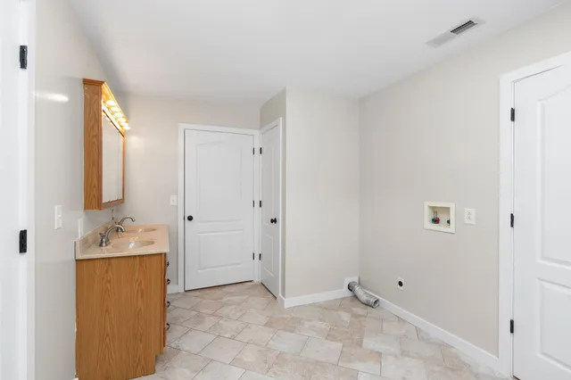 a view of a bathroom with a toilet sink