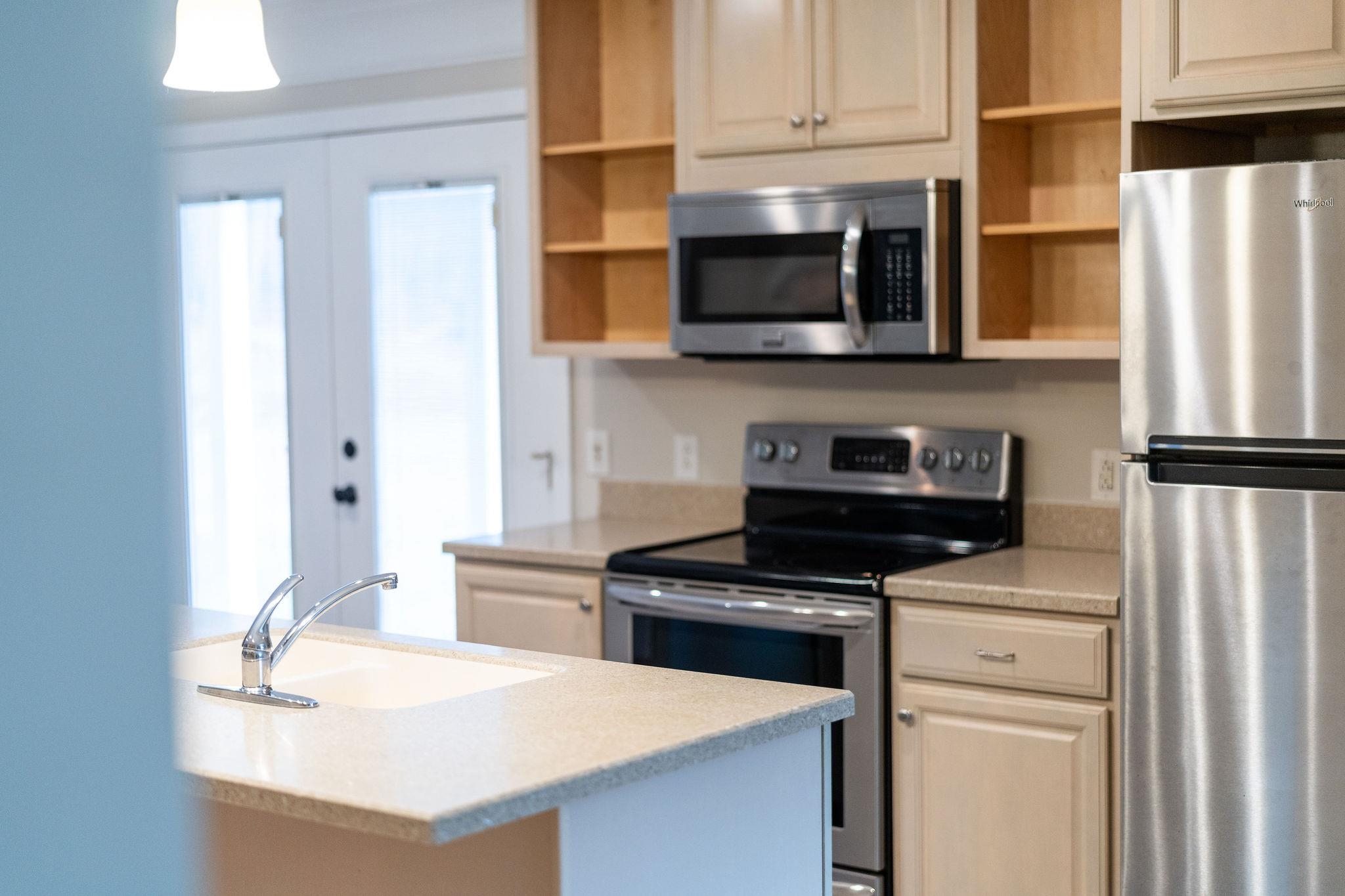 198 Turk Mountain Lane Waynesboro, VA 22980 - Photo 47 of 58 a kitchen with stainless steel appliances a stove microwave and a refrigerator