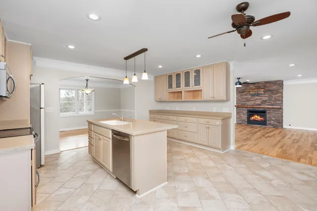 a kitchen with a stove and a sink