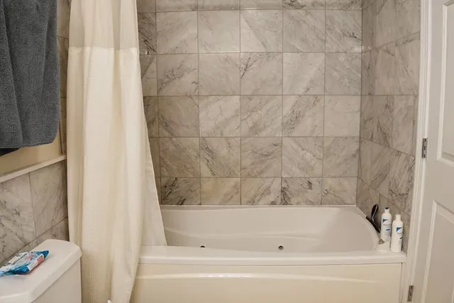 a bathroom with a bathtub