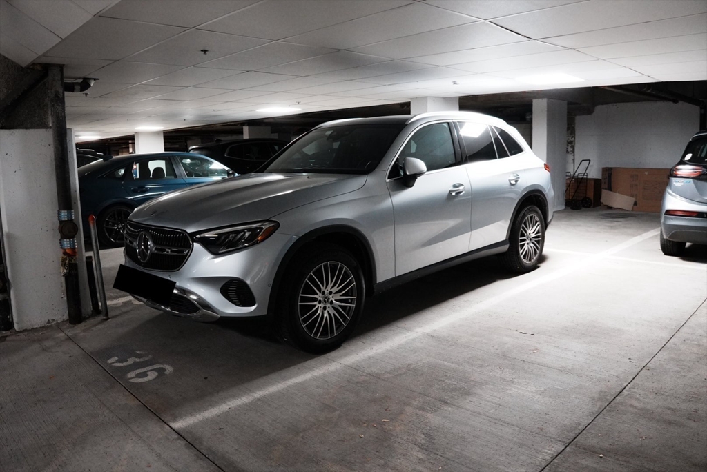 110 Cypress Street, Unit 307 Brookline, MA 02445 - Photo 23 of 24 a car parked in garage