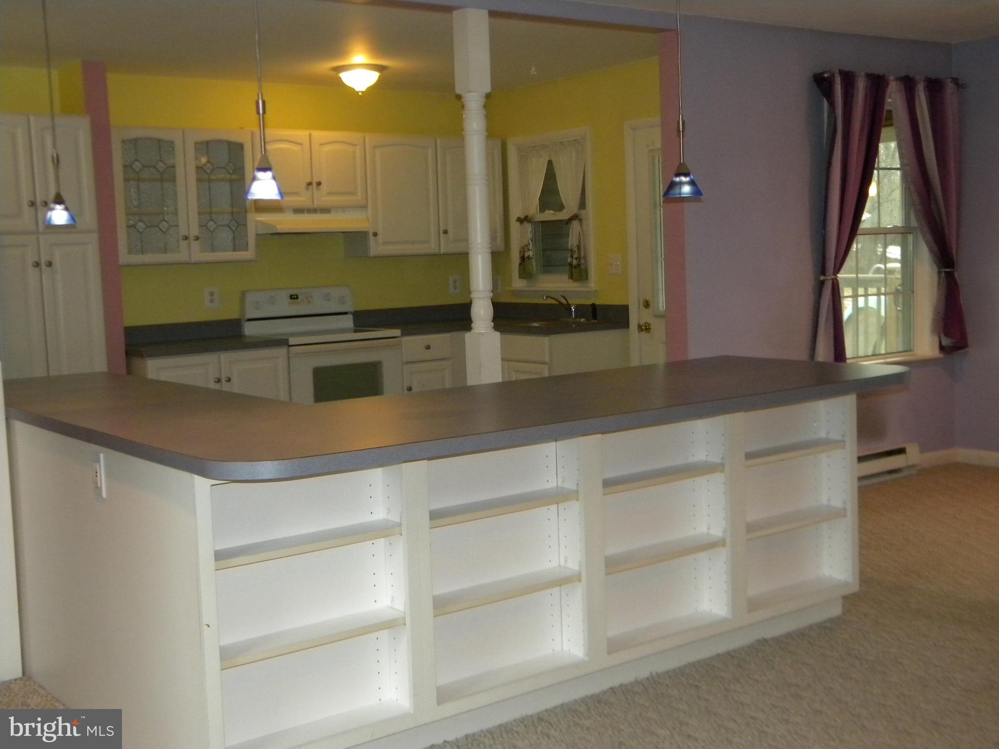 4520 Church Road Hampstead, MD 21074 - Photo 3 of 28 In Law Suite Kitchen and Island Bar Seating