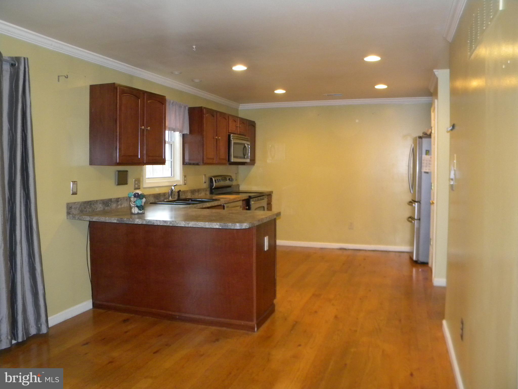4520 Church Road Hampstead, MD 21074 - Photo 21 of 28 Breakfast Area into Kitchen