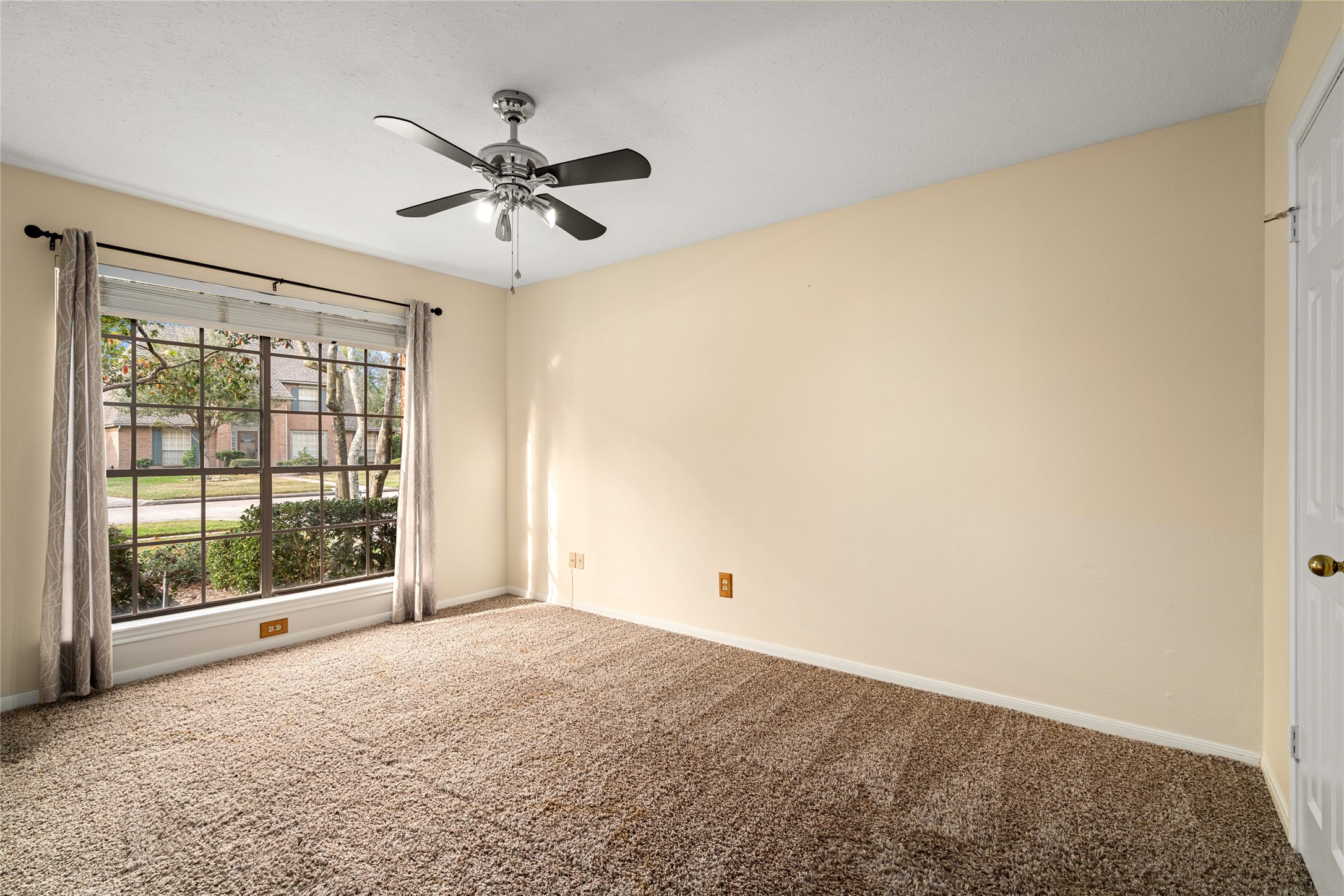 16106 Ridge Park Drive Houston, TX 77095 - Photo 12 of 23 a view of an empty room with a window
